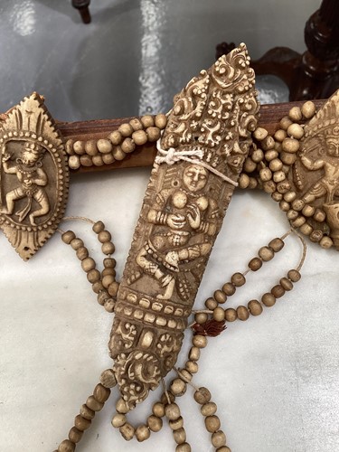 Lot 89 - A Tibetan carved bone necromancer's apron,...