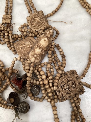 Lot 89 - A Tibetan carved bone necromancer's apron,...
