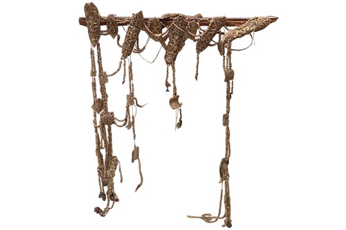 Lot 89 - A Tibetan carved bone necromancer's apron,...