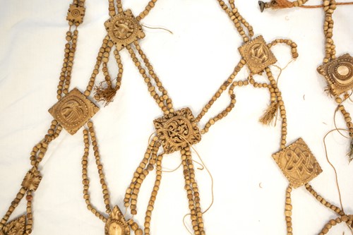 Lot 89 - A Tibetan carved bone necromancer's apron,...