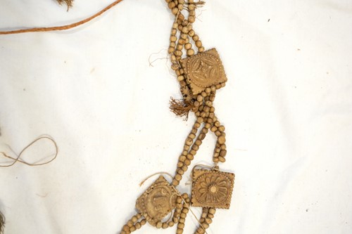 Lot 89 - A Tibetan carved bone necromancer's apron,...