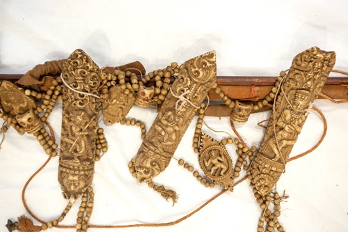 Lot 89 - A Tibetan carved bone necromancer's apron,...