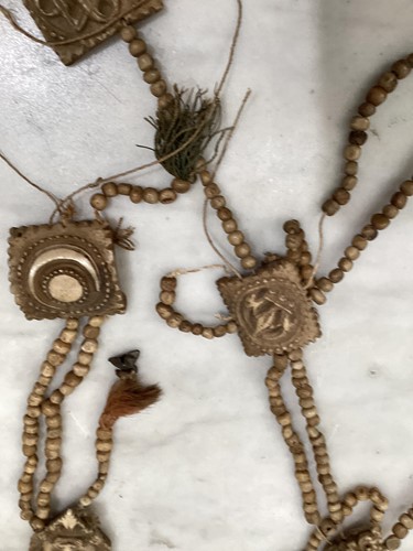 Lot 89 - A Tibetan carved bone necromancer's apron,...