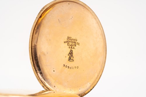 Lot 404 - A Waltham gold plated pocket watch, together...