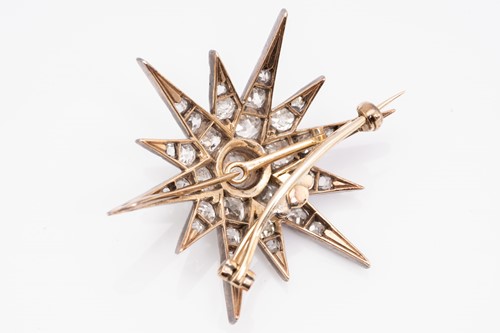 Lot 79 - A Victorian diamond starburst brooch, the...
