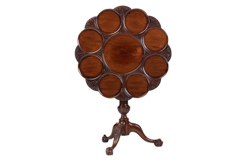 Lot 133 - A George III style mahogany revolving supper...