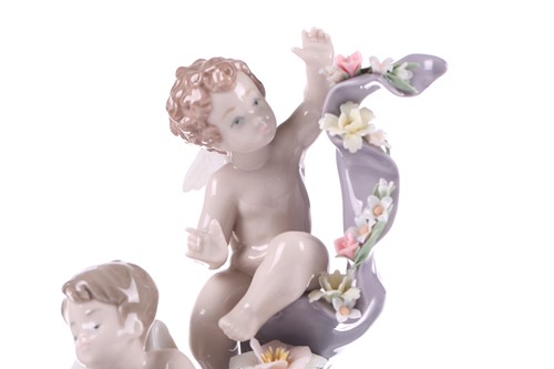 Lot 196 - A Lladro porcelain "Angelic Time" (5973)...