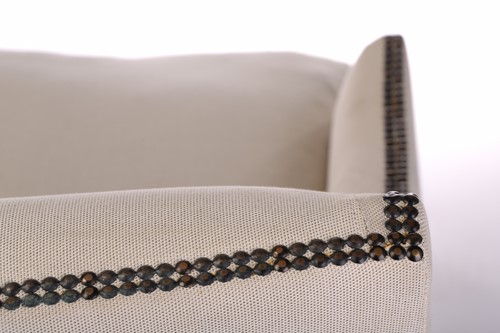 Lot 104 - A George III style two-seat sofa with swept...