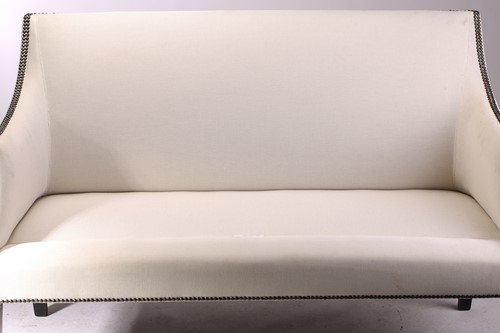 Lot 104 - A George III style two-seat sofa with swept...