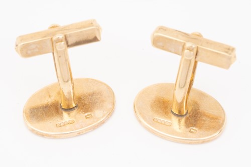 Lot 47 - A pair of 9ct yellow gold cufflinks, the oval...