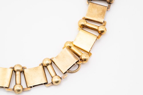 Lot 65 - A yellow metal book link chain necklace,...