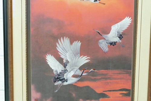 Lot 84 - A large Japanese embroidered picture of cranes...