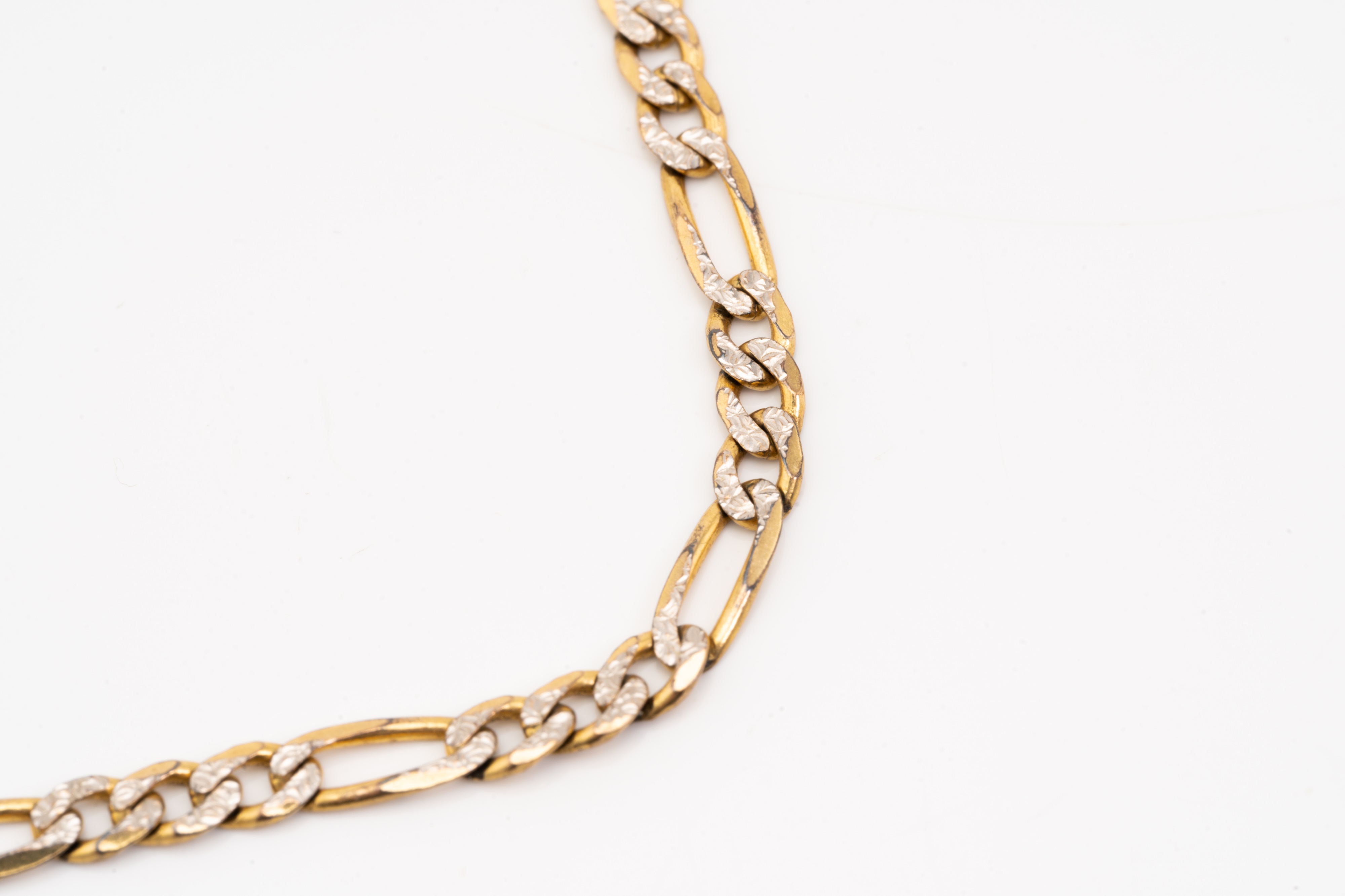 Lot 166 - Two 9ct yellow gold chains; consisting of a
