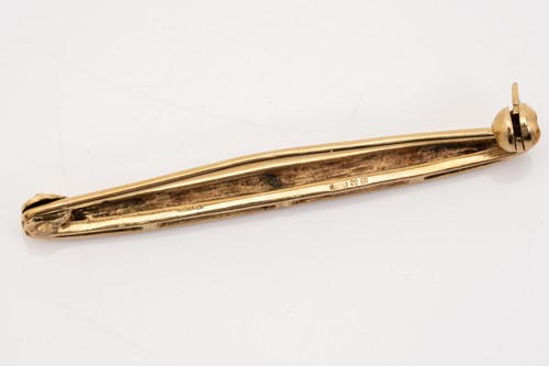 Lot 50 - A 9ct gold and diamond tie pin, fitted with...
