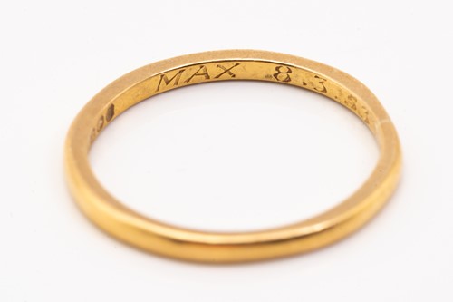 Lot 175 - Four gold rings and a platinum ring; including...
