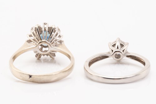 Lot 186 - A diamond solitaire ring and a sapphire dress...