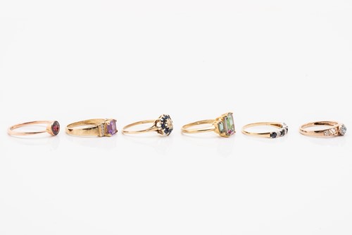 Lot 23 - A 9ct yellow gold and amethyst dress ring,...