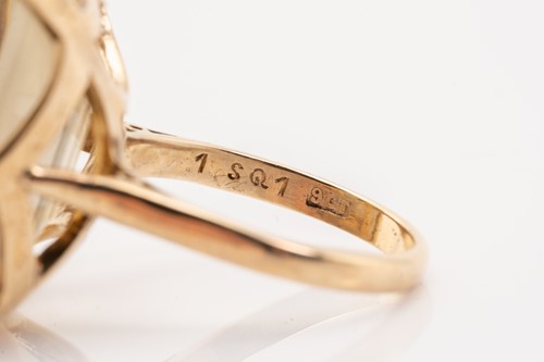 Lot 192 - A large smoky quartz cocktail ring and a...