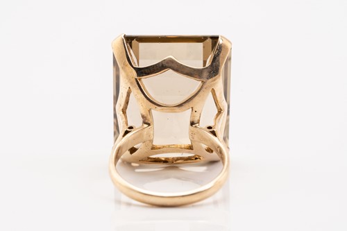 Lot 192 - A large smoky quartz cocktail ring and a...