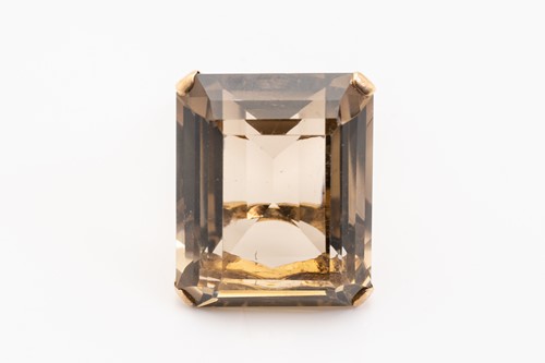 Lot 192 - A large smoky quartz cocktail ring and a...
