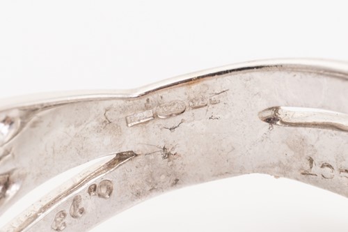 Lot 241 - A 9ct white gold diamond ring, set with a...