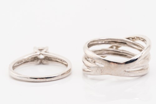 Lot 241 - A 9ct white gold diamond ring, set with a...