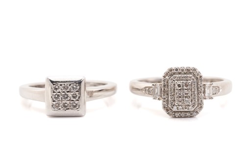 Lot 136 - Two diamond set cluster rings in white metal,...
