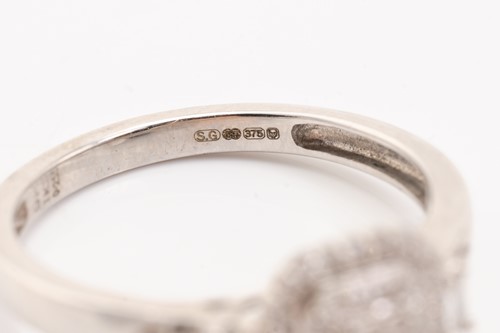 Lot 136 - Two diamond set cluster rings in white metal,...