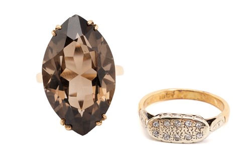 Lot 102 - A smoky quartz dress ring and an Edwardian...