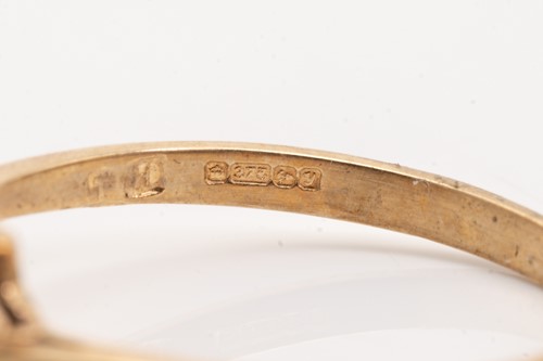 Lot 135 - Five gold rings; including a yellow metal and...