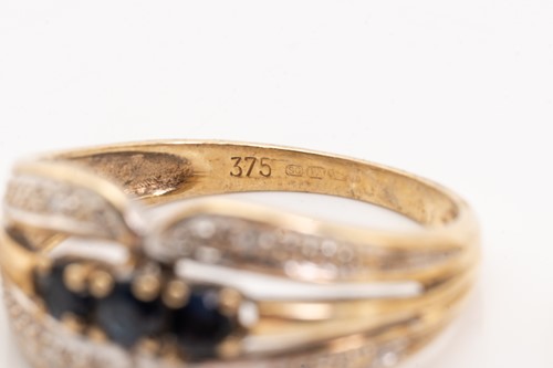 Lot 135 - Five gold rings; including a yellow metal and...