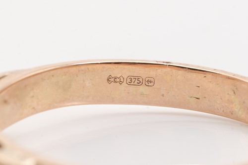 Lot 135 - Five gold rings; including a yellow metal and...