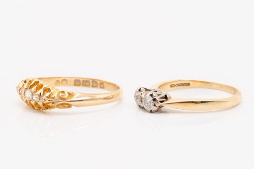 Lot 221 - Two 18ct gold diamond-set rings; consisting of...
