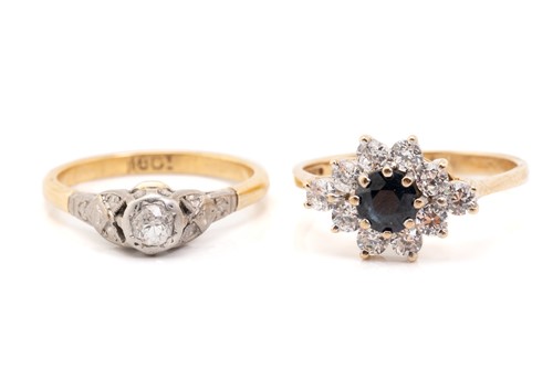 Lot 229 - A single stone diamond ring and a sapphire and...
