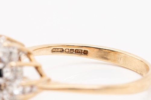 Lot 229 - A single stone diamond ring and a sapphire and...
