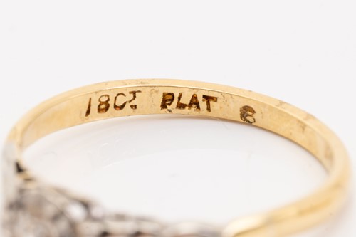 Lot 225 - Two diamond solitaire rings; consisting of an...