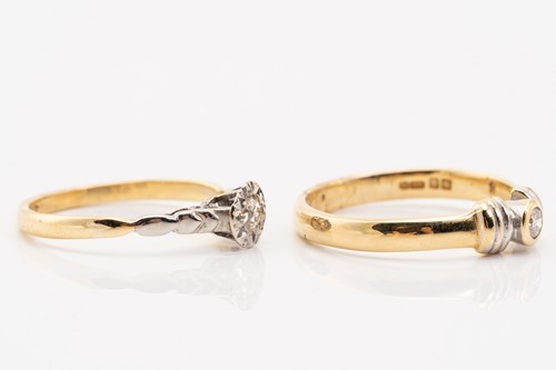 Lot 225 - Two diamond solitaire rings; consisting of an...
