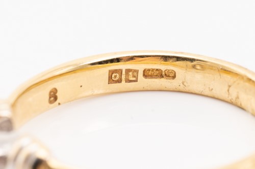 Lot 225 - Two diamond solitaire rings; consisting of an...