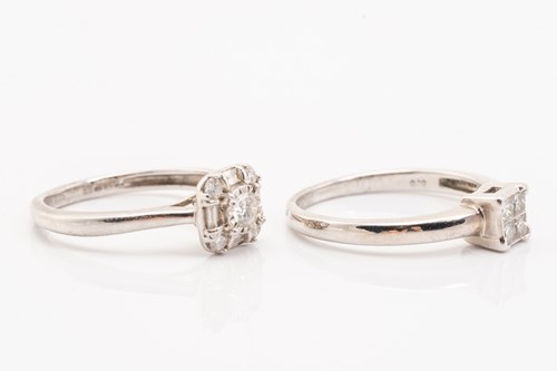 Lot 168 - Two diamond cluster rings in white gold; the...