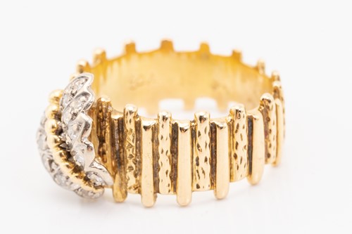 Lot 46 - A yellow metal and diamond ring, designed with...