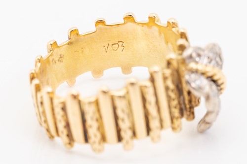 Lot 46 - A yellow metal and diamond ring, designed with...
