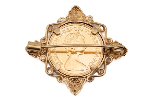Lot 240 - An Elizabeth II half sovereign brooch in 9ct...