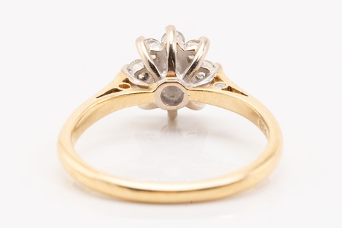 Lot 230 - A diamond set cluster ring, featuring nine...
