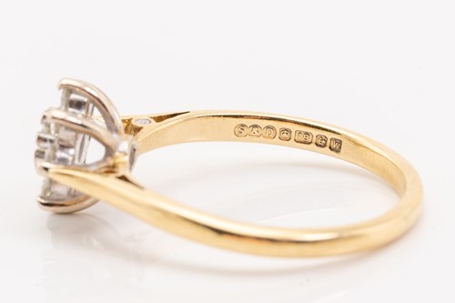 Lot 230 - A diamond set cluster ring, featuring nine...