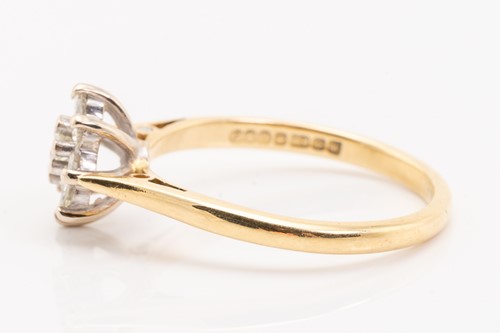 Lot 230 - A diamond set cluster ring, featuring nine...