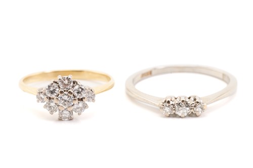 Lot 174 - Two diamond set rings, featuring a 9-stone...