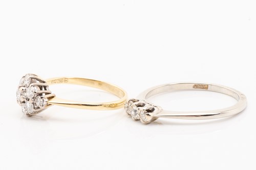 Lot 174 - Two diamond set rings, featuring a 9-stone...