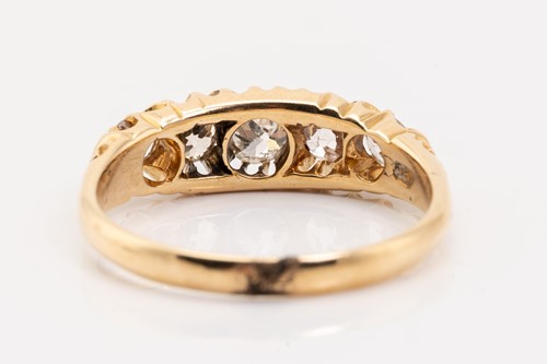 Lot 176 - An Edwardian half hoop five-stone diamond ring,...