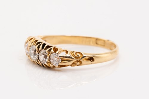 Lot 176 - An Edwardian half hoop five-stone diamond ring,...