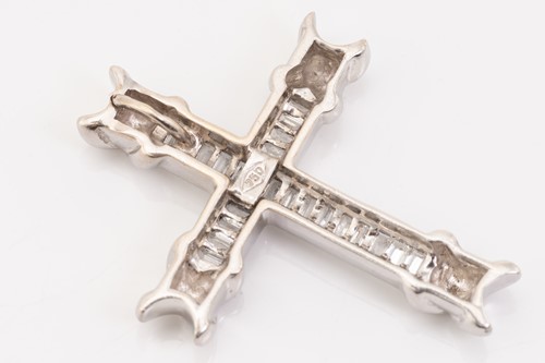 Lot 191 - A diamond-set cross pendant, comprising twenty-...